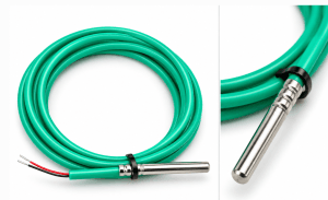 Green flexible temperature probe with stainless steel sensor and exposed red and black wires on a white background; coiled cable edge visible